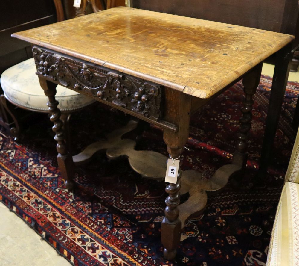 A 17th century and later carved oak side table with spiral-twist supports, width 86cm depth 59cm height 73cm